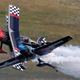 Illustration for article titled Racing A Lambo In A Biplane Is The Pitts